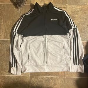 Size medium (10-12) from adidas doesn’t have any stains and in perfect condition
